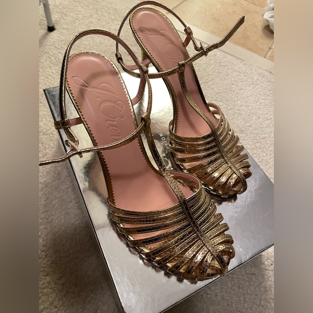 Never worn. Gold strappy 2.5-3 inch heels. JCrew. Size 8US. Excellent condition.